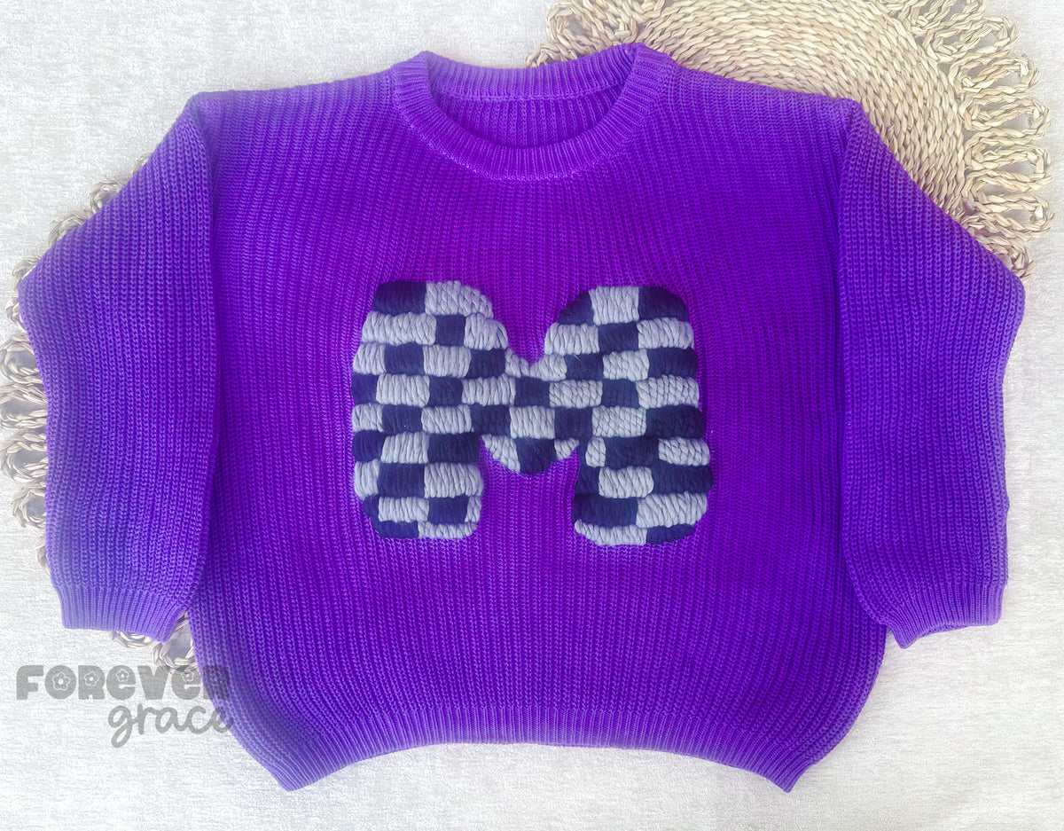 Checkered Letter Sweater